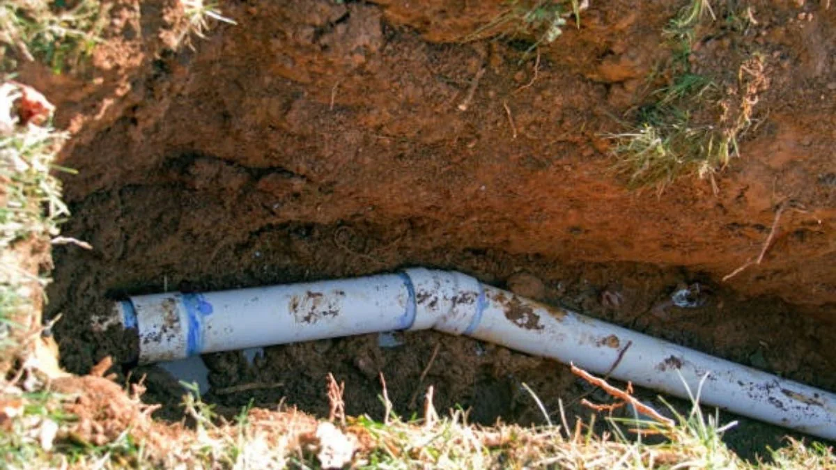 New PVC sewer line laid in a trench at a Florida home