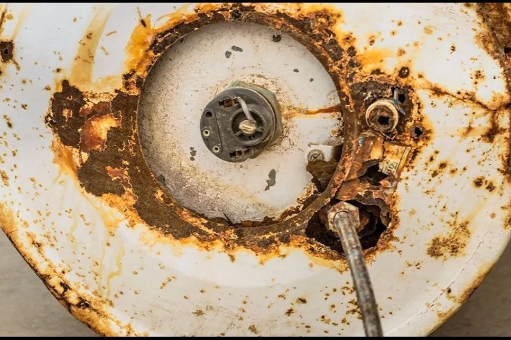 Old water heater removed before a replacement